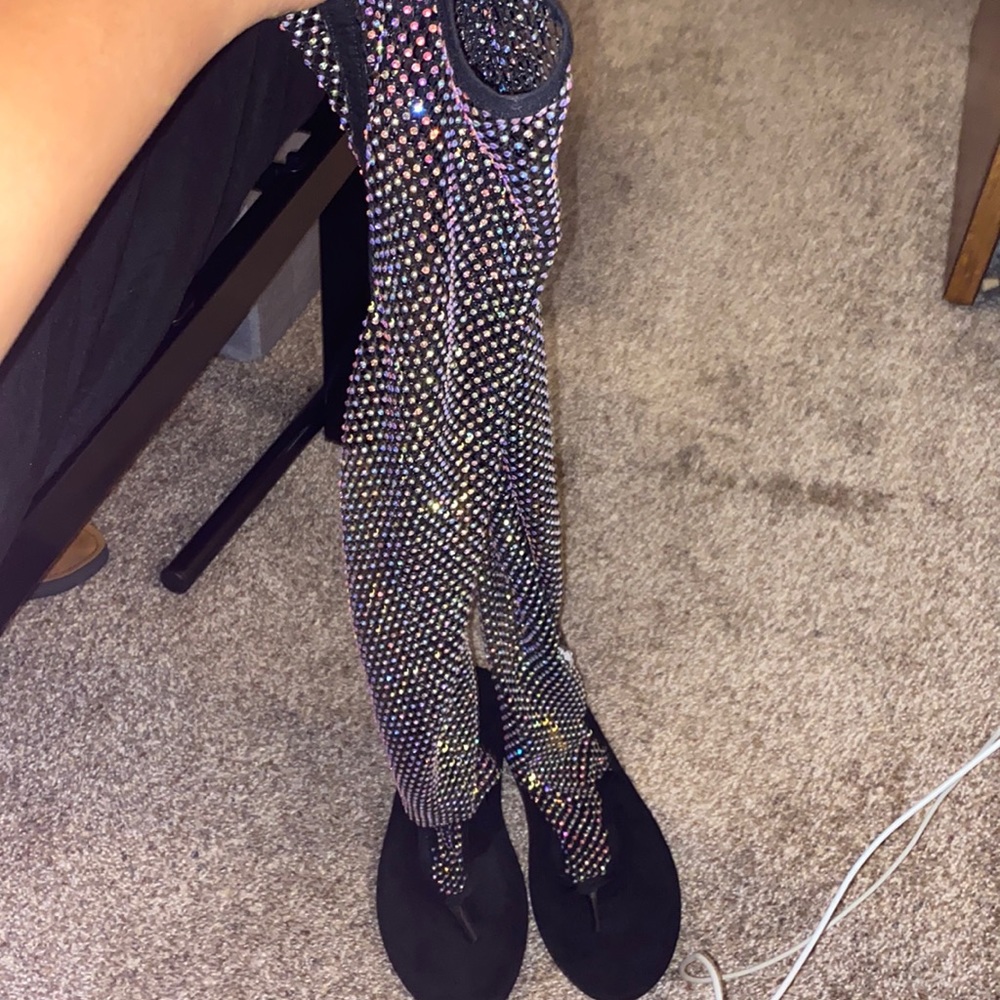 Knee high sandals.